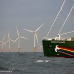 Rainbow Warrior Passes Amalia Wind Farm